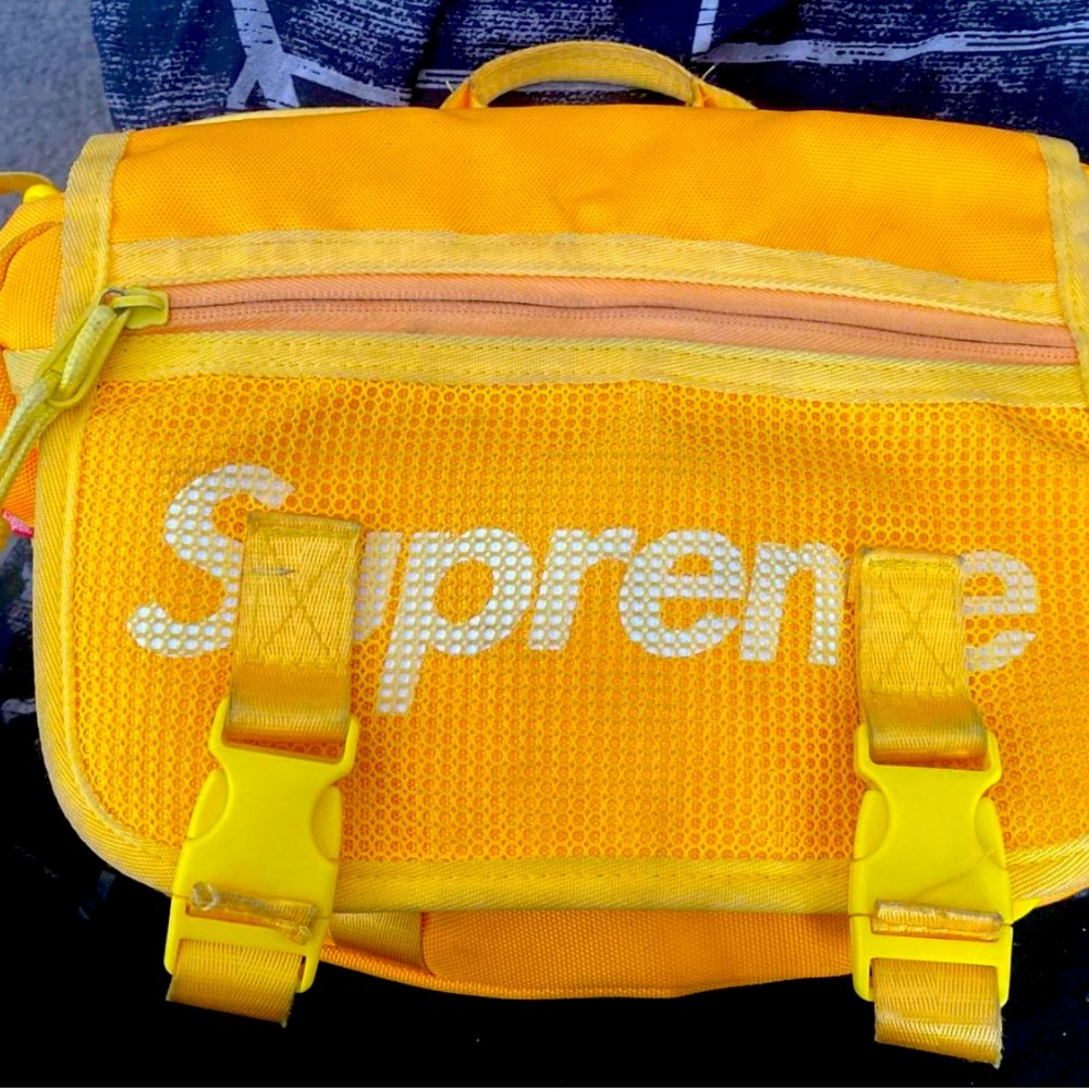Supreme Yellow Messenger Bag with Bold Branding and Water-Resistant Material